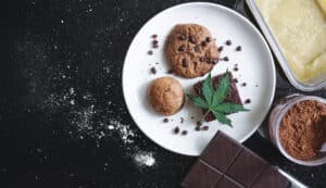 Baked desserts Cookie, Brownie and Bun Infused with Cannabis, with Marijuana leaf and ingredients